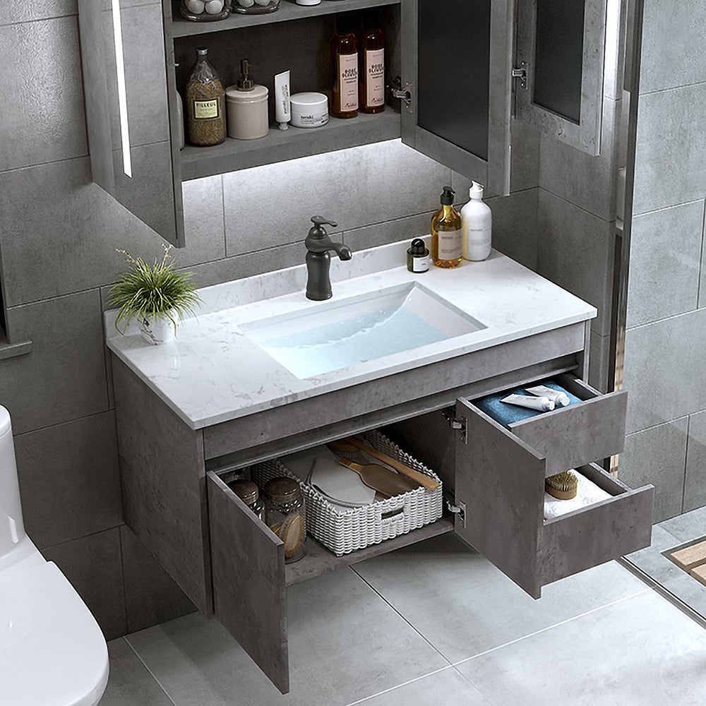 Bathroom vanity with open cabinet doors displaying toiletries and storage items.