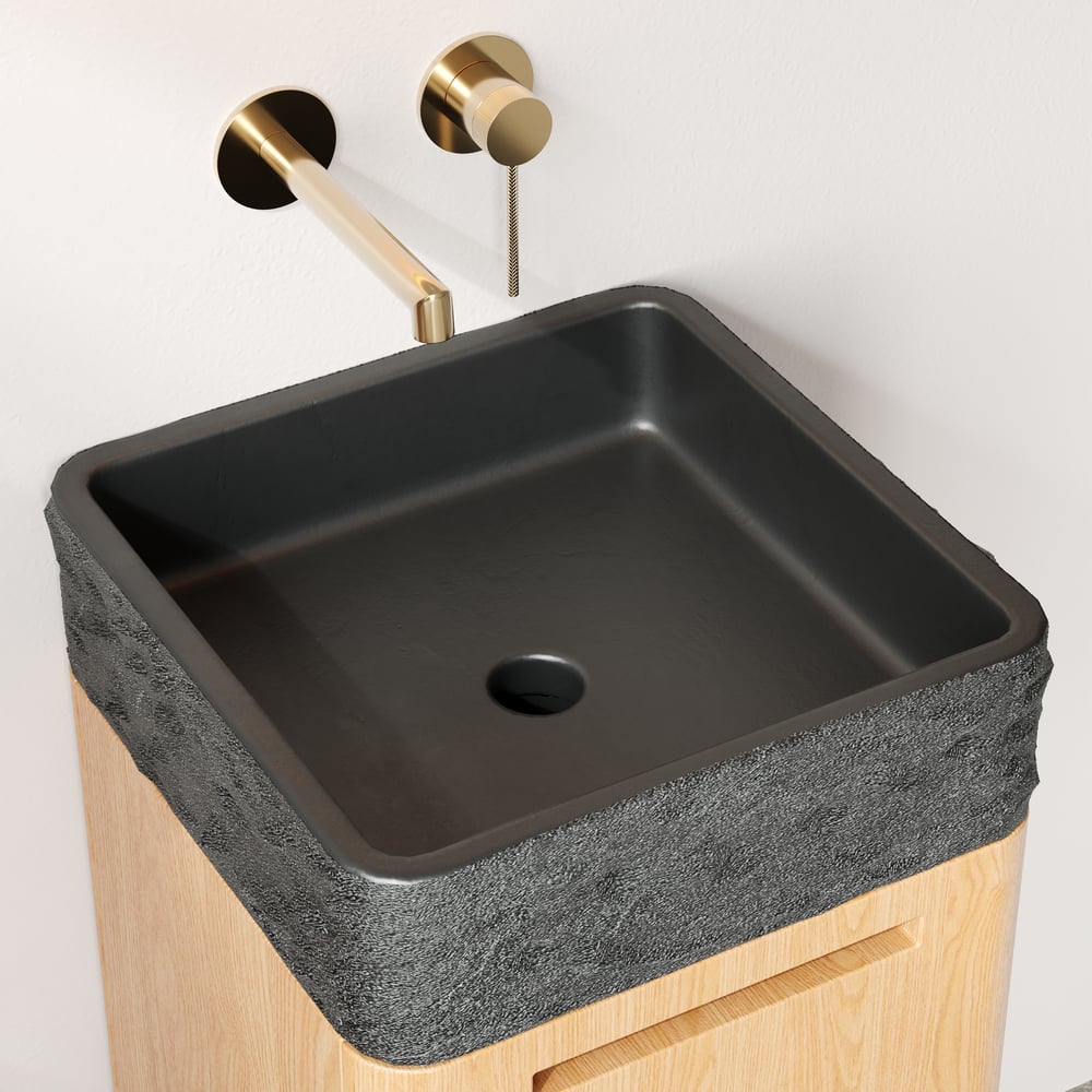 Black sink with gold faucet on a white background