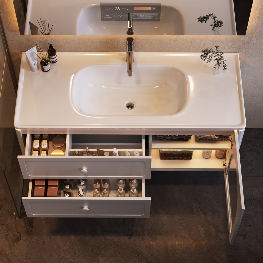 Bathroom vanity with sink and open drawers displaying toiletries