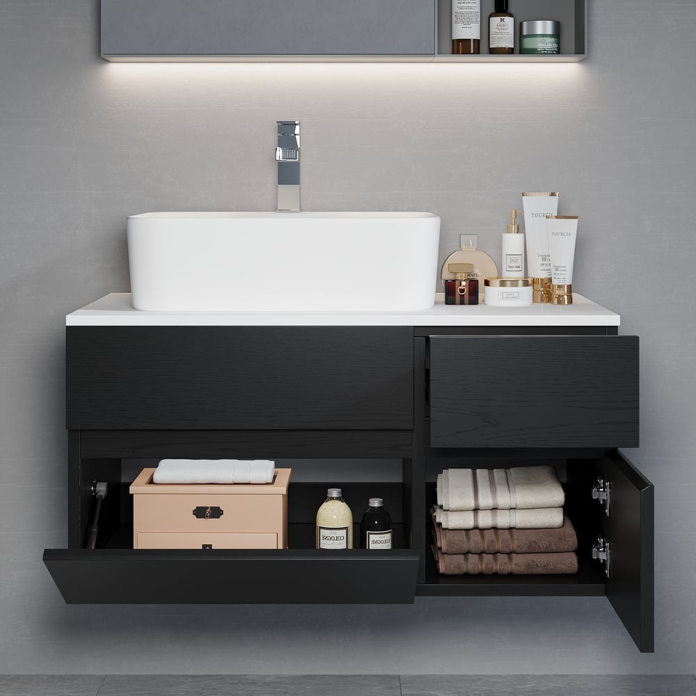 Bathroom vanity with sink, cabinets, and toiletries on a gray wall background