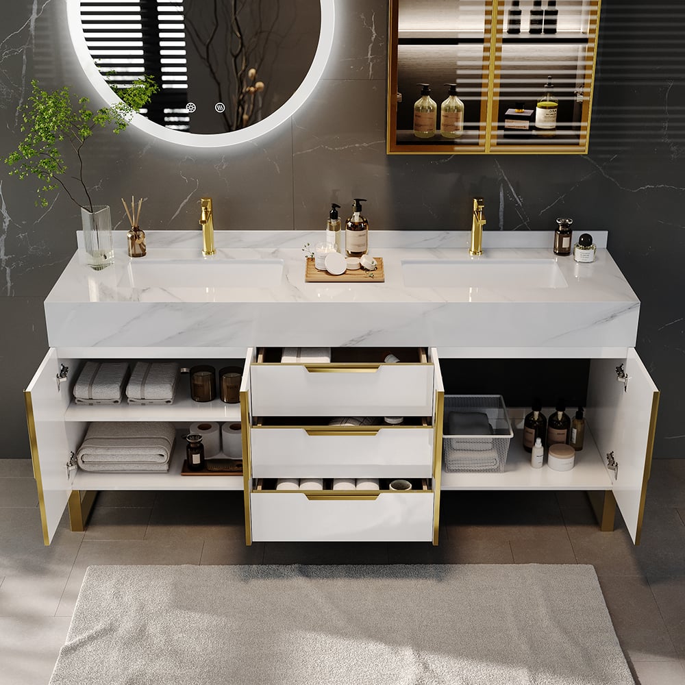 Bathroom vanity with marble countertop, gold fixtures, and various toiletries.