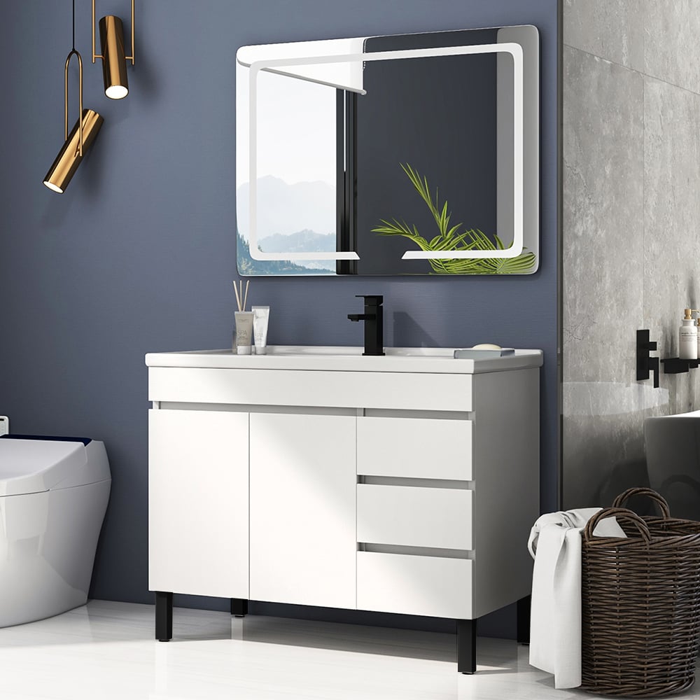 Bathroom with white vanity, mirror, and decorative elements