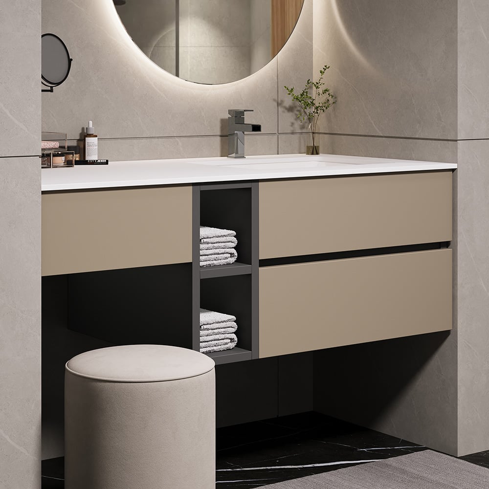 Bathroom vanity with white countertop, cabinets, and a stool.