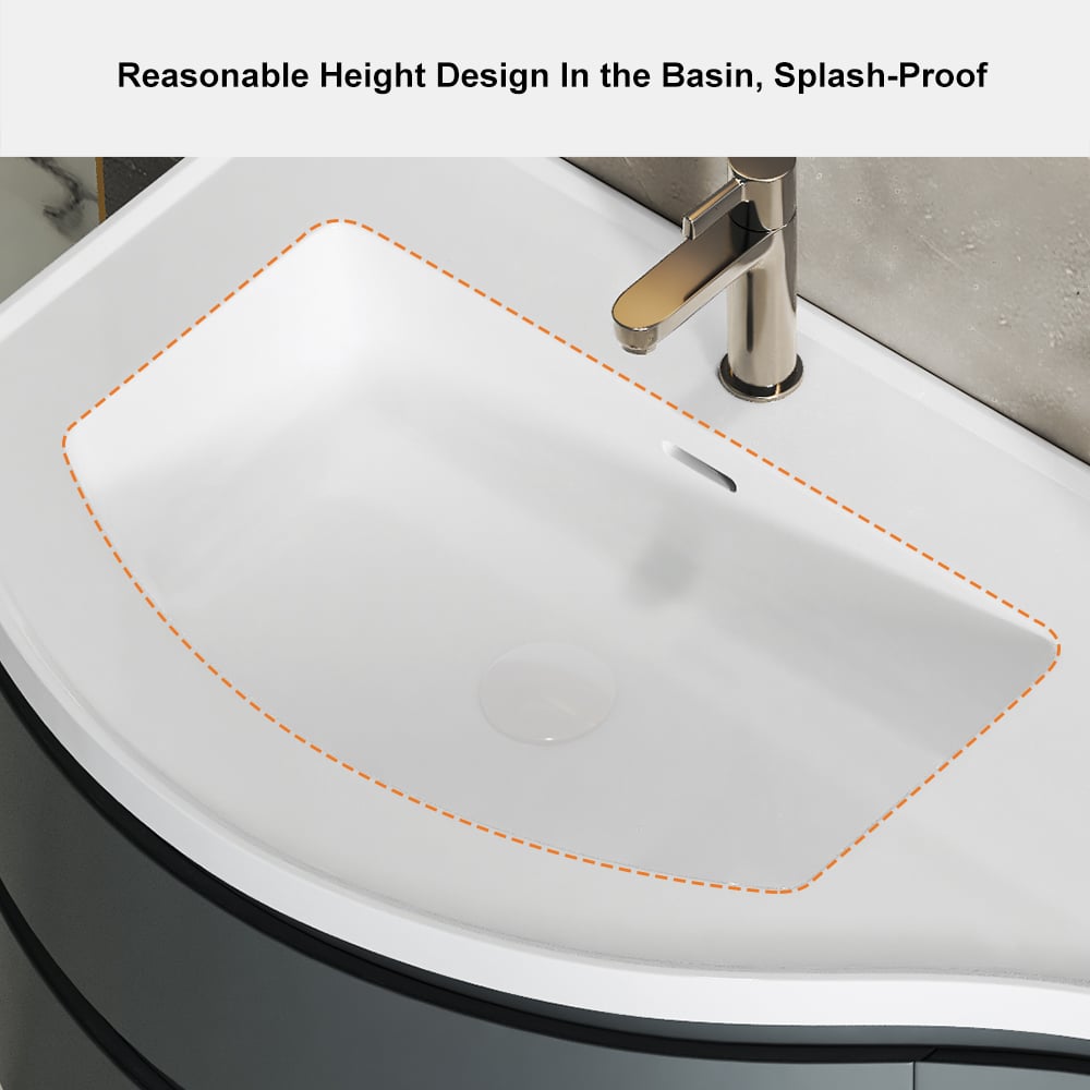 White sink with a silver faucet in a bathroom setting