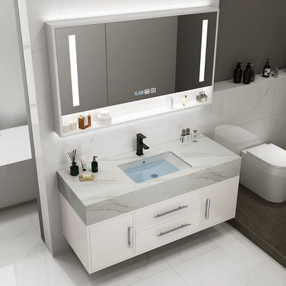 Bathroom vanity with sink, mirror, and toiletries in a modern bathroom setting.