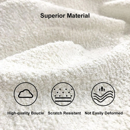 Close-up of white fabric with 'Superior Material' text and icons indicating high-quality boucle, scratch resistance, and durability.