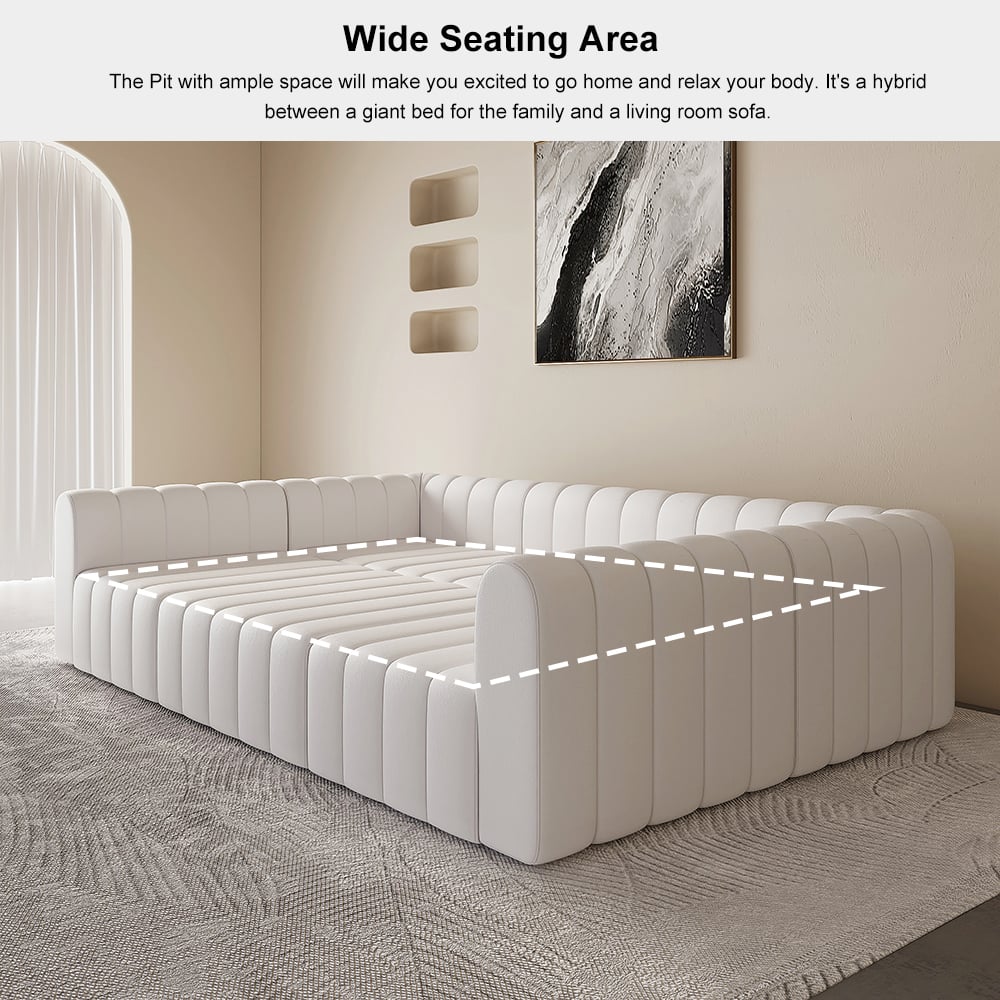 White sectional sofa in a room with a neutral color palette