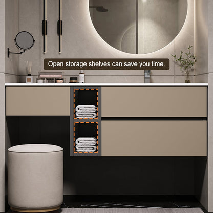 Bathroom vanity with open storage shelves displaying towels, illuminated by a large mirror.