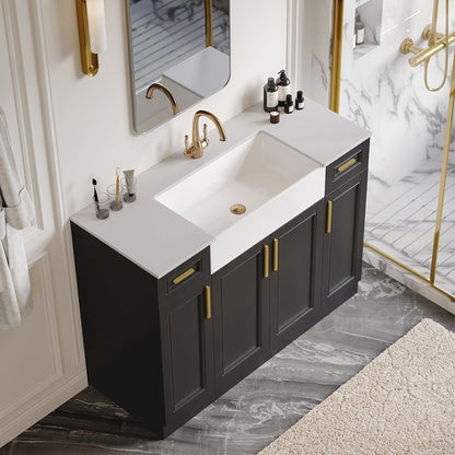Bathroom vanity with white countertop, sink, and gold fixtures.