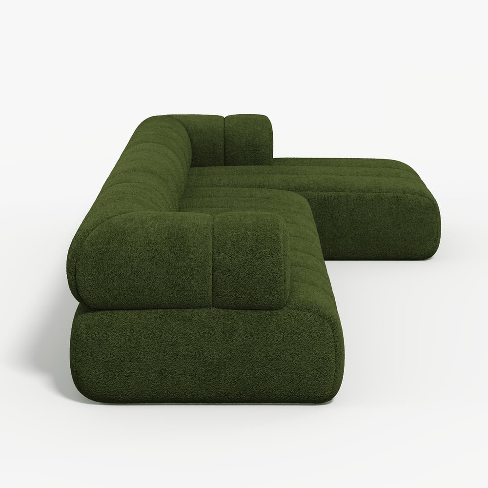 Green modular sofa on a white background