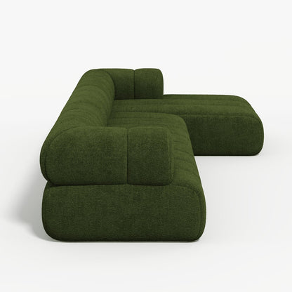 Green modular sofa on a white background