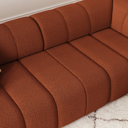 Brown textured sofa on a light-colored floor.
