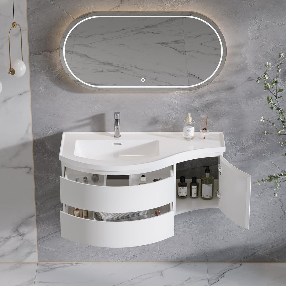 Bathroom vanity with open cabinet, sink, and mirror in a marble bathroom setting.