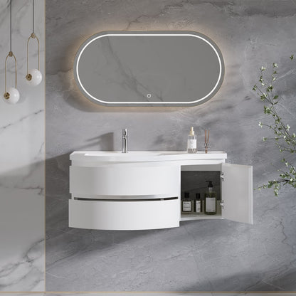 Bathroom vanity with open cabinet, illuminated mirror, and decorative elements on a gray marble wall.