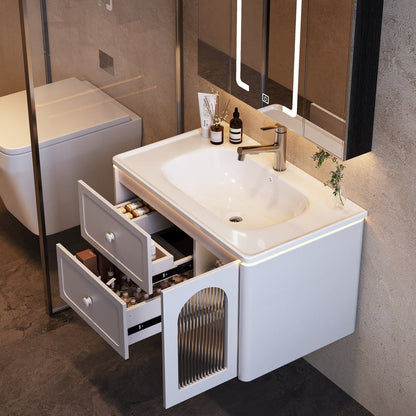 Bathroom vanity with sink and open drawer, featuring toiletries.