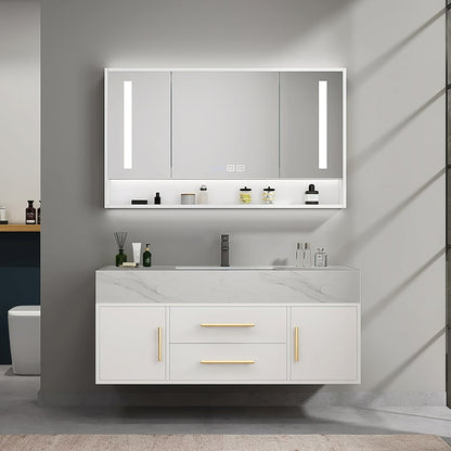 Bathroom vanity with illuminated mirror and various toiletries on a gray wall.
