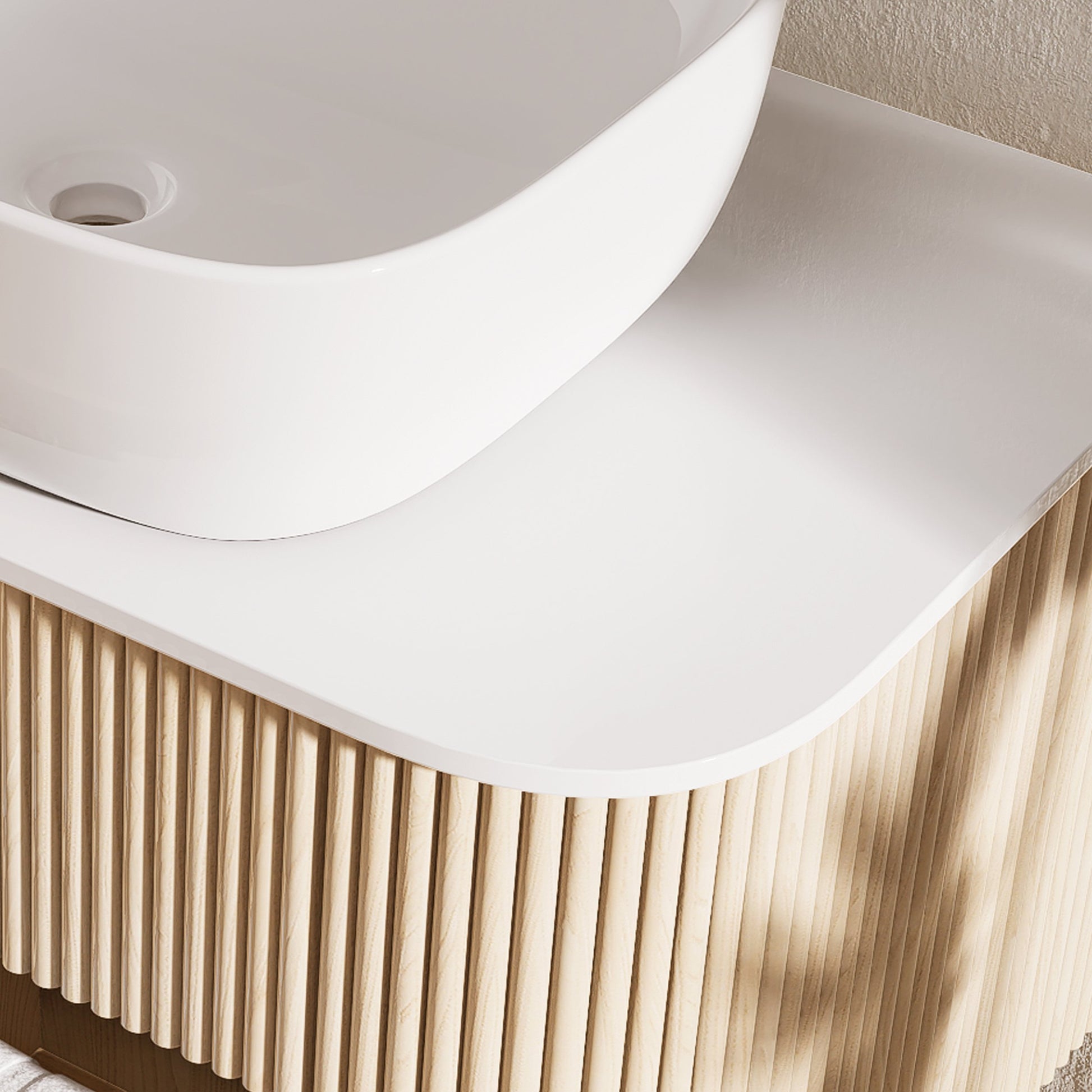White sink on a wooden vanity