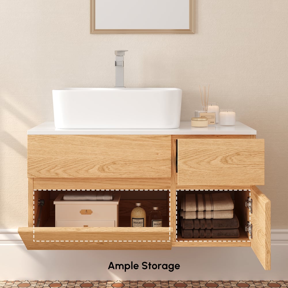 Bathroom vanity with open cabinet showing storage compartments, sink, and towels.