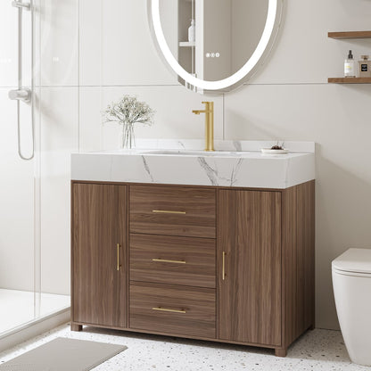 Bathroom vanity with wooden cabinet, white countertop, and gold fixtures.