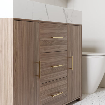 Wooden bathroom cabinet with gold handles in a modern bathroom setting.