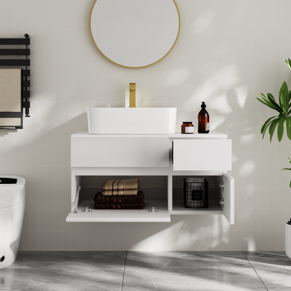 Modern bathroom with white vanity, sink, and open cabinet.