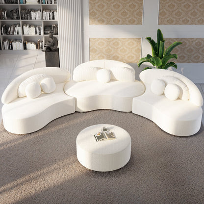 Modern white sofa with round cushions in a stylish living room.
