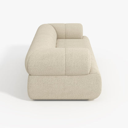 Beige upholstered chair on a white background