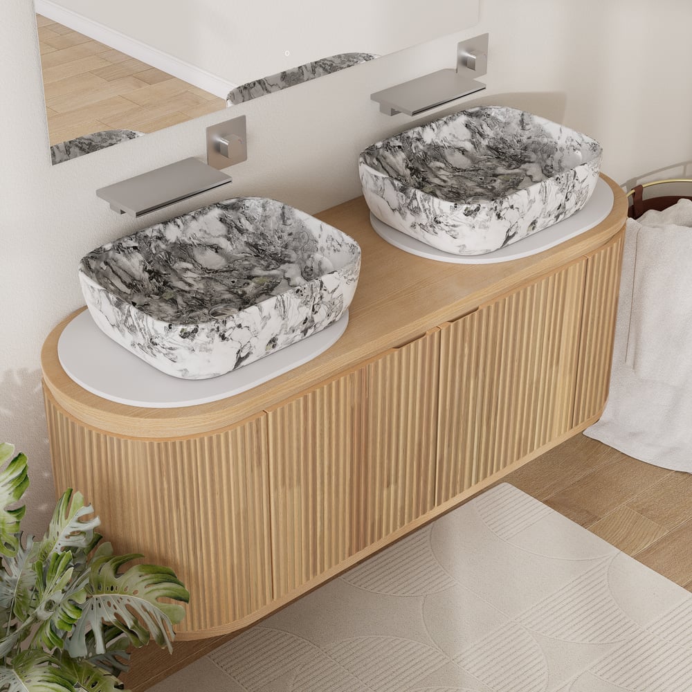 Bathroom vanity with two marble sinks and wooden cabinet