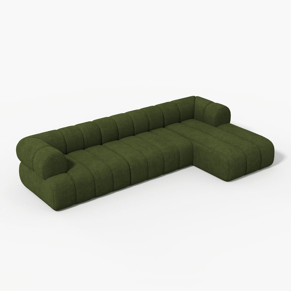 Green L-shaped sofa on a white background