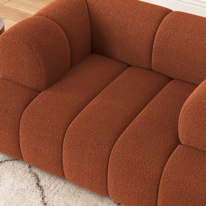Brown textured sofa with a neutral background