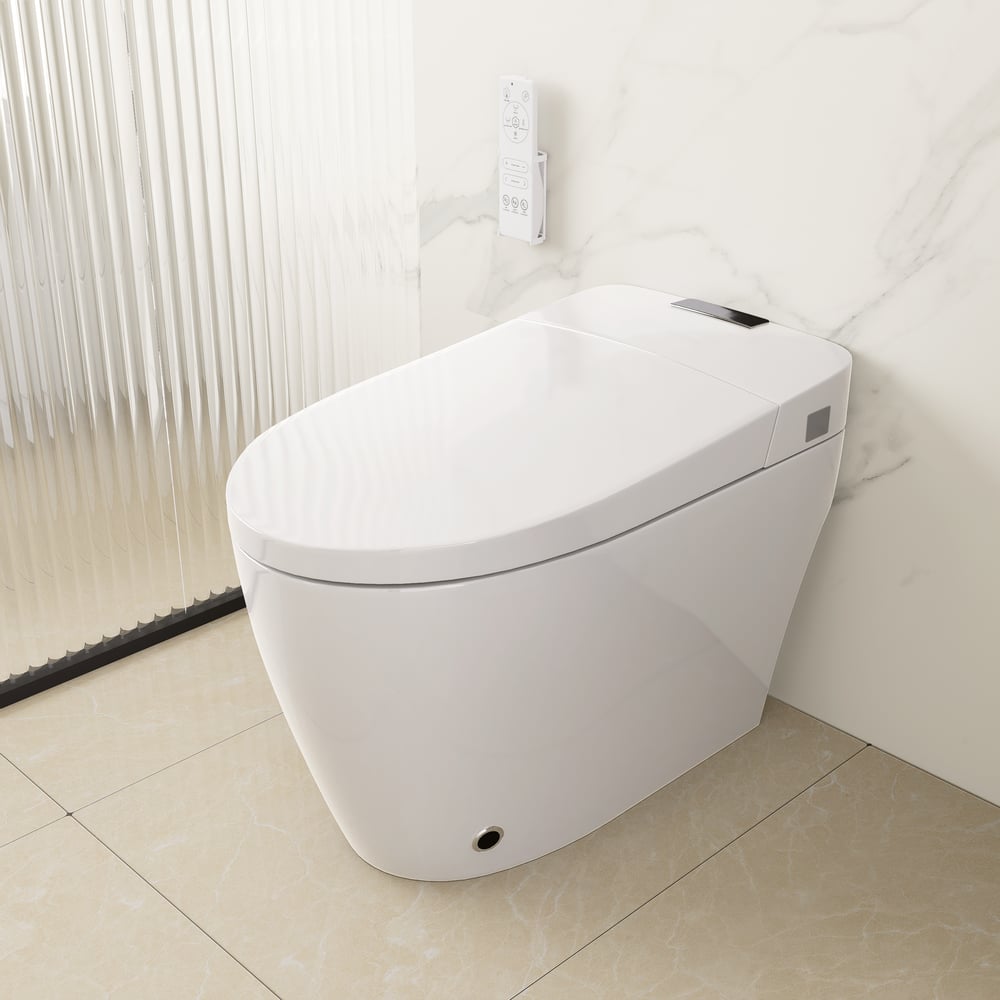 Modern white toilet in a bathroom setting with tiled floor and wall.