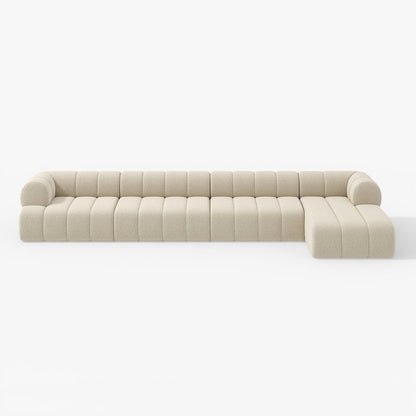 Beige sectional sofa on a white background
