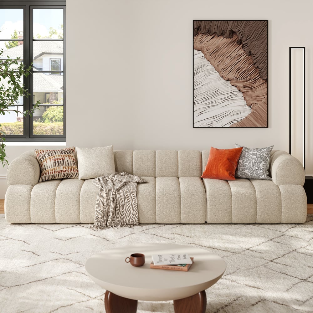 Beige sofa with colorful pillows in a living room setting