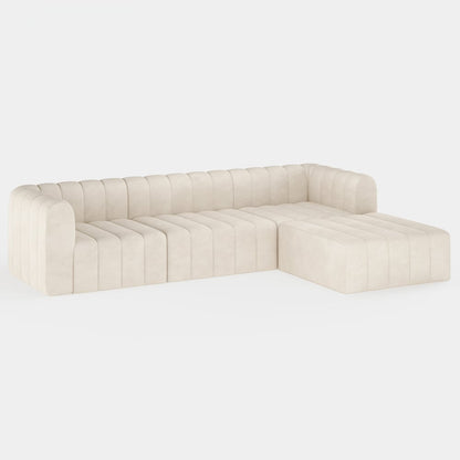 Off white sectional sofa on a white background