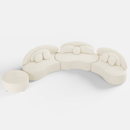 White, abstract sculpture resembling a cloud or wave on a white background