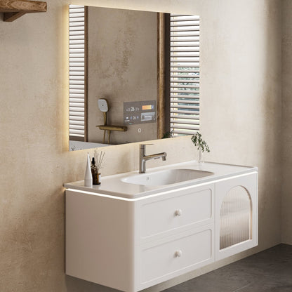 Bathroom vanity with sink and mirror in a modern setting
