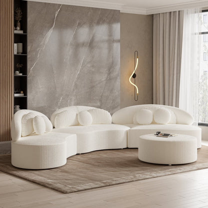 Modern white sofa set in a stylish living room with marble wall and window.