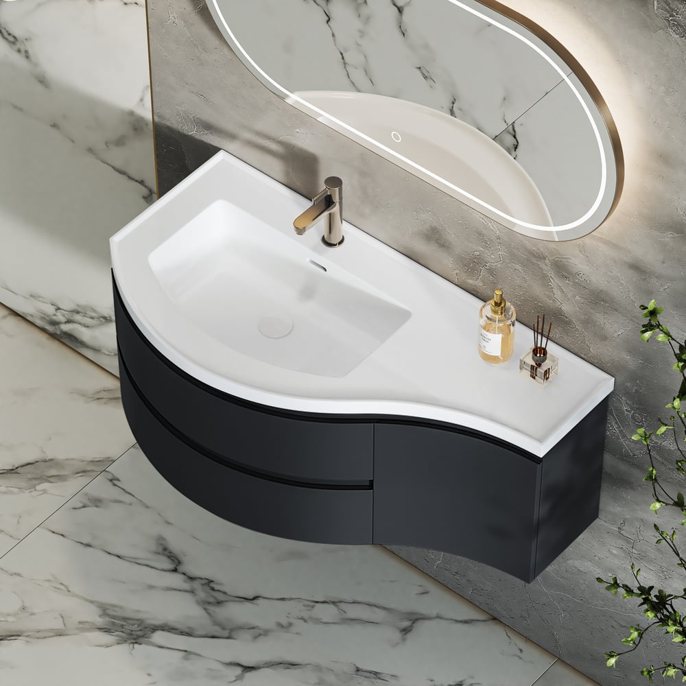 Corner sink with black base and white countertop in a modern bathroom setting.
