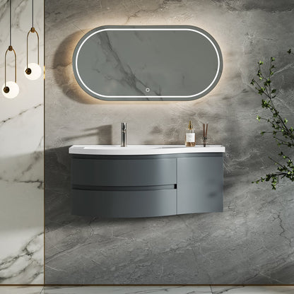 Bathroom vanity with mirror and sink against a marble wall