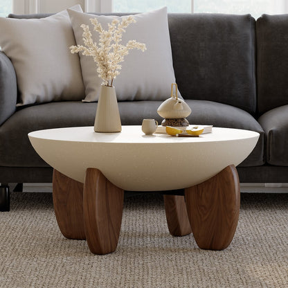 Coffee table with decorative items in a living room setting