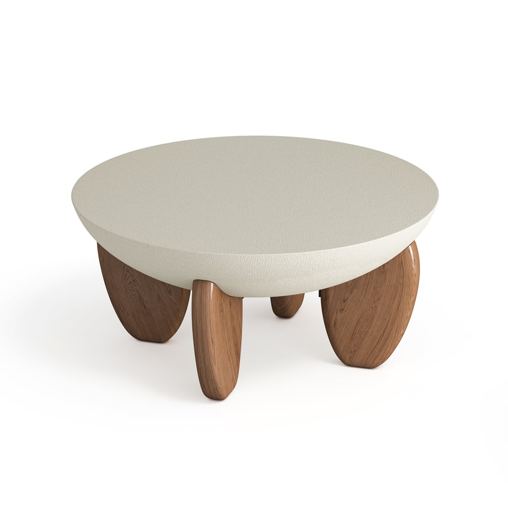 Round coffee table with a white top and wooden legs on a white background