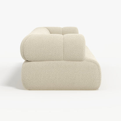 Beige textured armchair on a white background