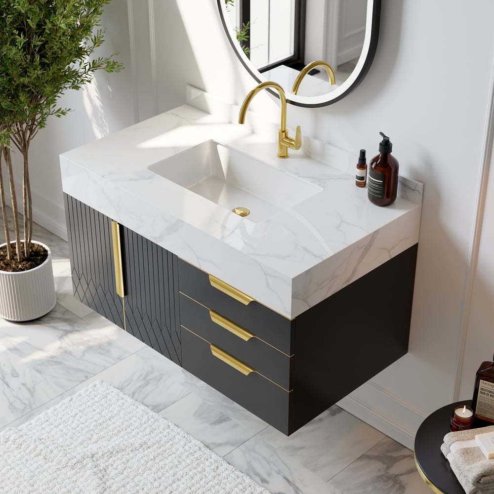 Bathroom vanity with white countertop, gold fixtures, and decorative elements.