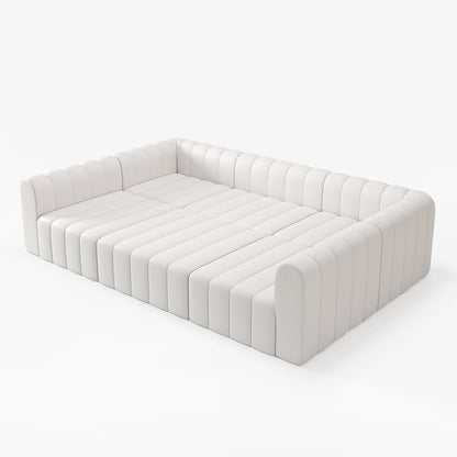 White tufted sofa on a white background