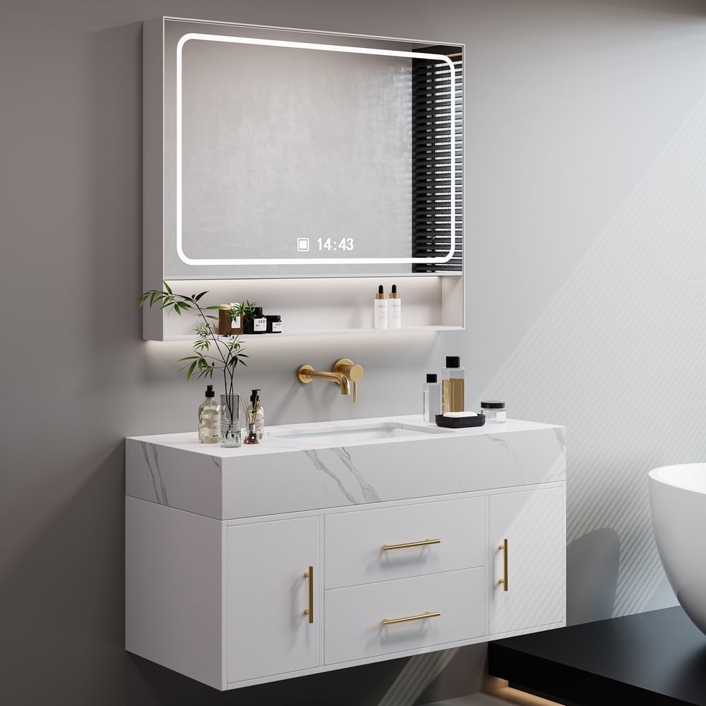 Modern bathroom vanity with illuminated mirror and various toiletries.