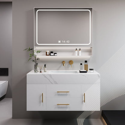 Modern bathroom vanity with illuminated mirror and various toiletries.