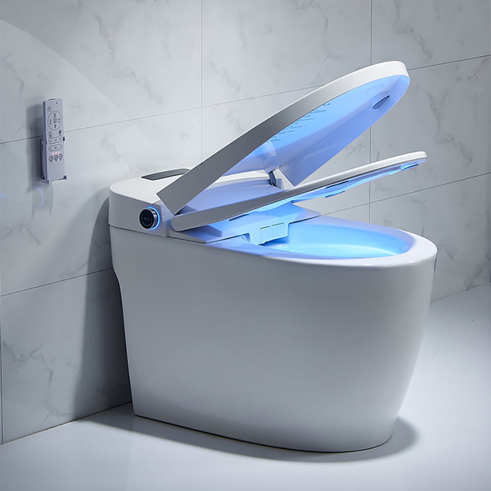 Modern toilet with illuminated seat in a bathroom setting