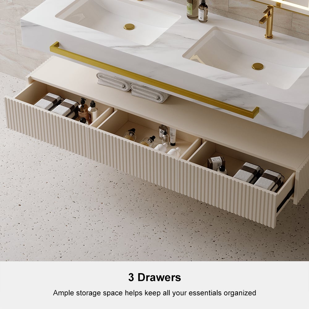 Bathroom vanity with three drawers and toiletries on a light surface.