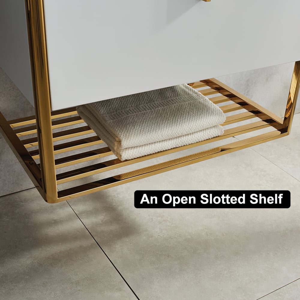 Gold open slotted shelf with a folded towel on a neutral background