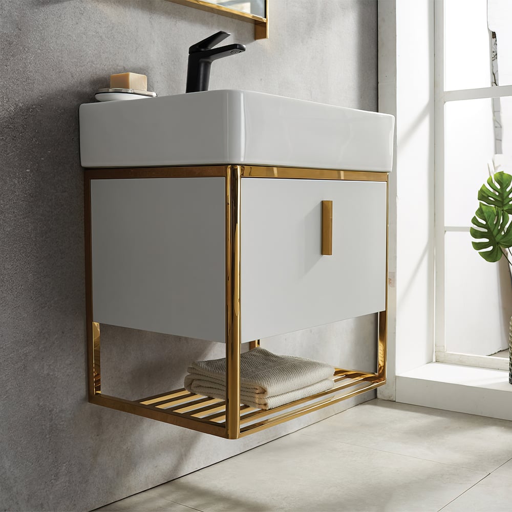 Bathroom vanity with white basin and gold frame in a bright room.